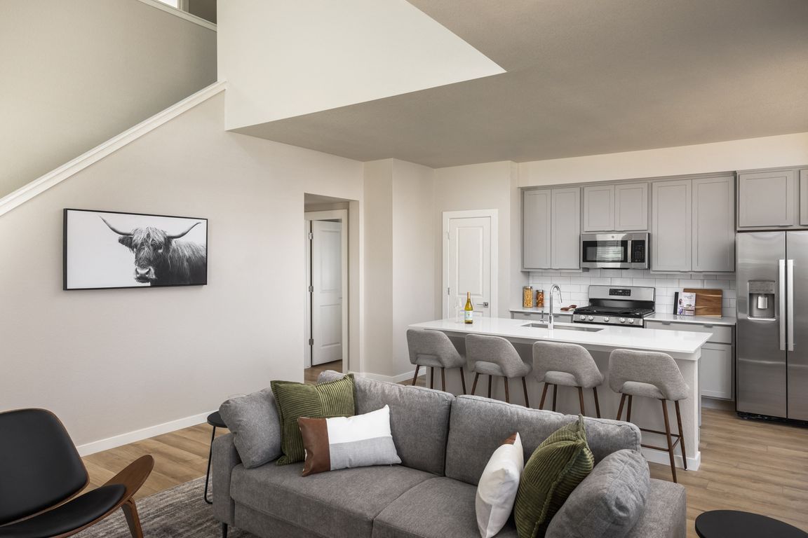 Elegant Spaces with Wood-Style Flooring on Main Floor