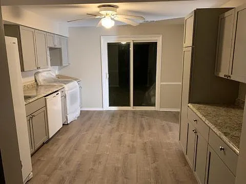 New kitchen with lots of storage and new life proof plank flooring thruout the house.