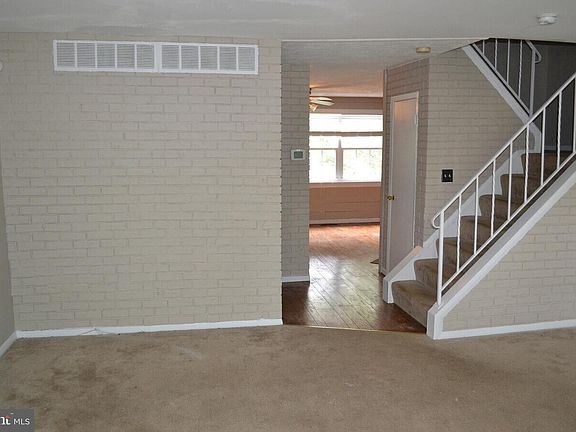 Kitchen/Dinning area and the stair to the top floor from the living room
