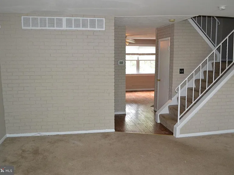 Kitchen/Dinning area and the stair to the top floor from the living room