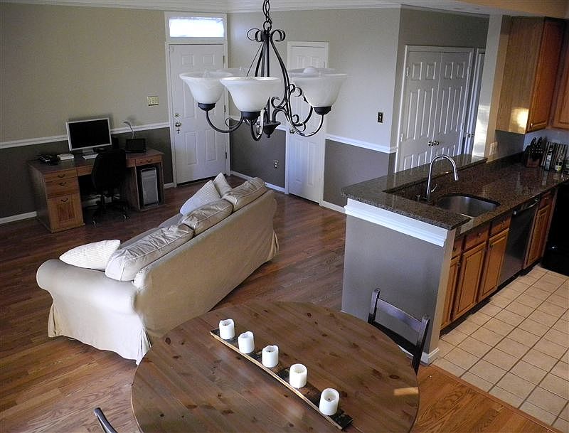 Living room - Wood floors, gas fire place, TV mount and hook