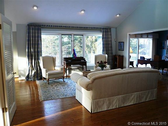 The spacious living room ha...