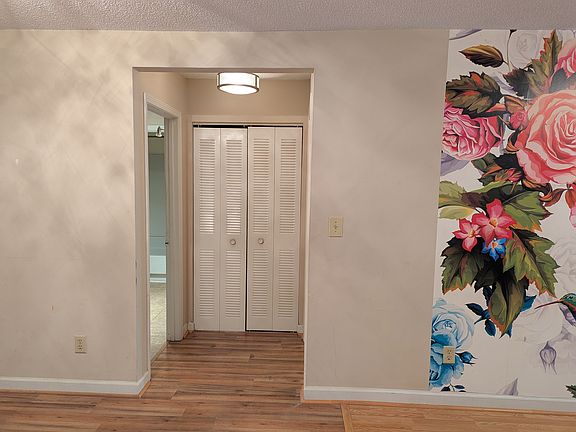 Closet between bedroom and bathroom