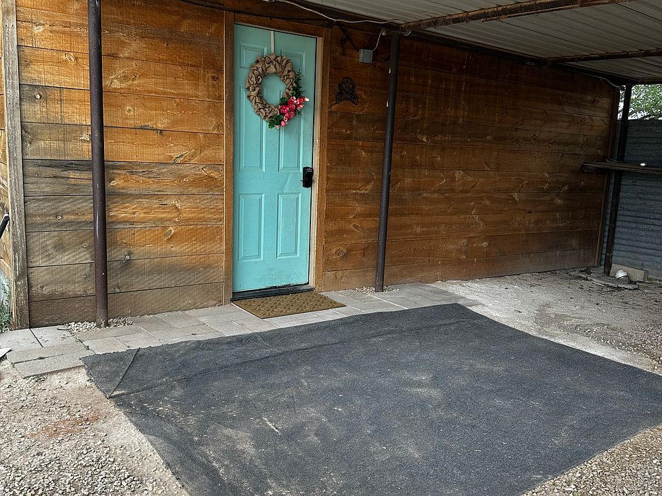 Front door/covered parking.