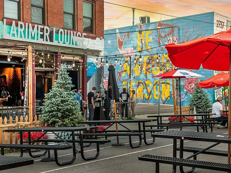 Located one block from Larimer St.