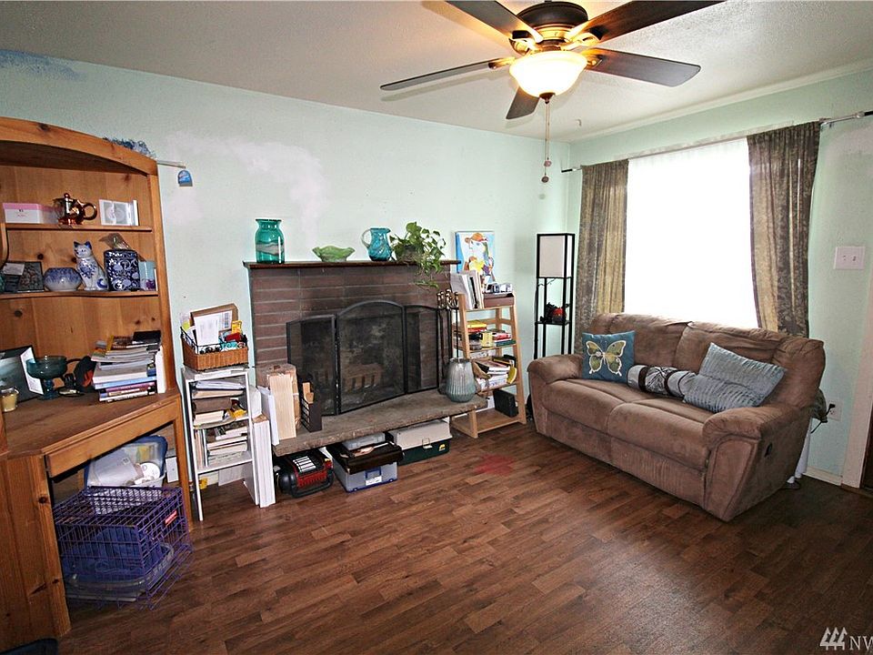Living room with woodburning fireplace