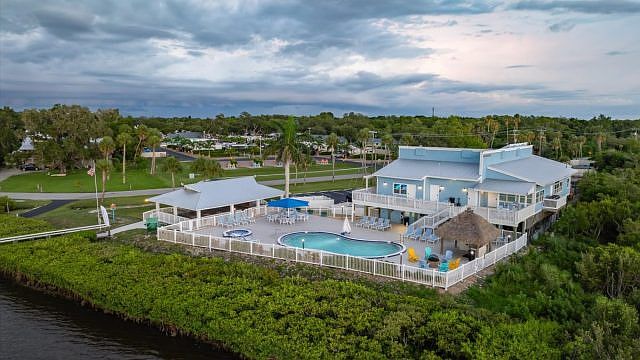 Community Waterfront Clubhouse, Heated Pool with Jetted Spa & Covered Pavilion