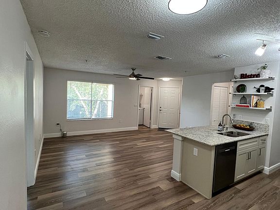 view of living room from back of dining room