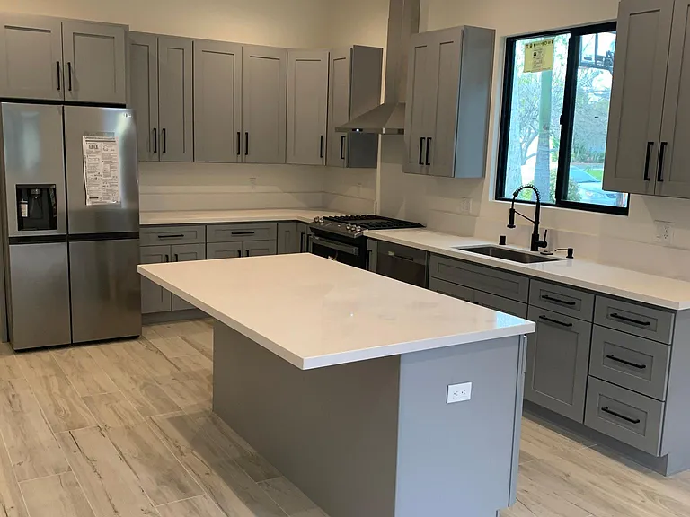 kitchen with brand new appliances and island