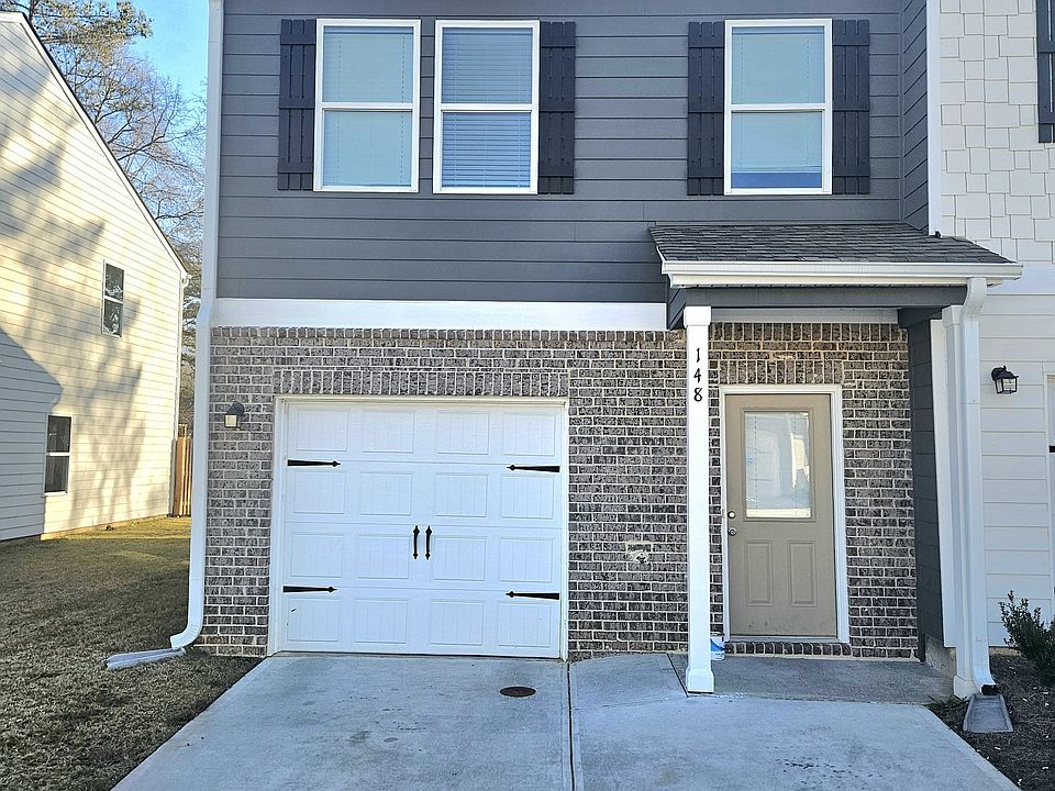 1st image of 148 Village Sq NW
