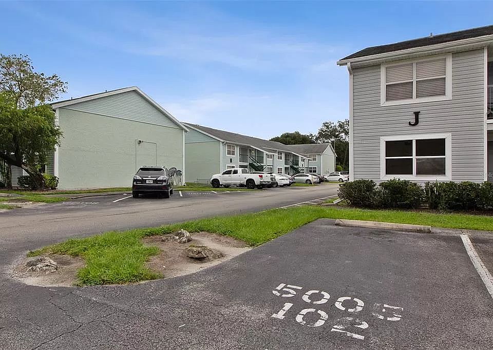 Front view with designated parking