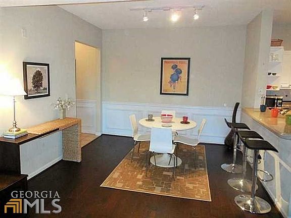 Size-able dining area is open to the kitchen and the living space. Check out the new wide-plank wood floors