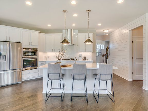 Kitchen with Stainless Steel Appliances and White Cabinets