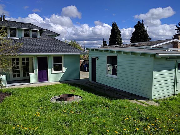 private fenced backyard and garage