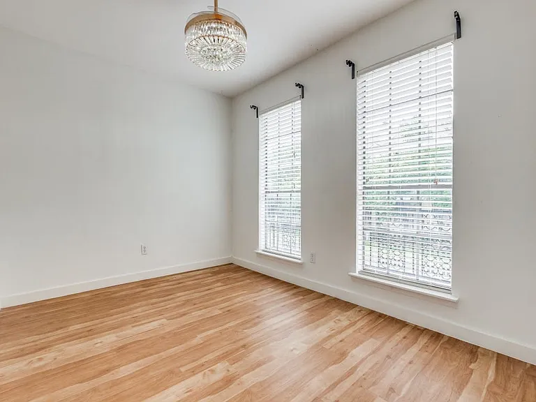 Generously sized guest bedroom with 2-closets and ensuite bathroom.