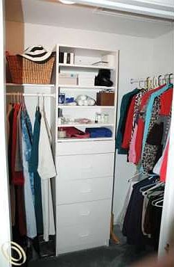 Walk-in closet in master suite.