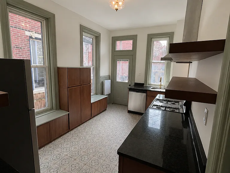 Walking into kitchen from dining room