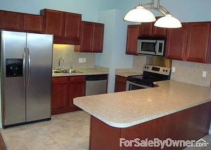 Brand new cherry stained kitchen : Appliances are included in our kitchen: Notice the large breakfas