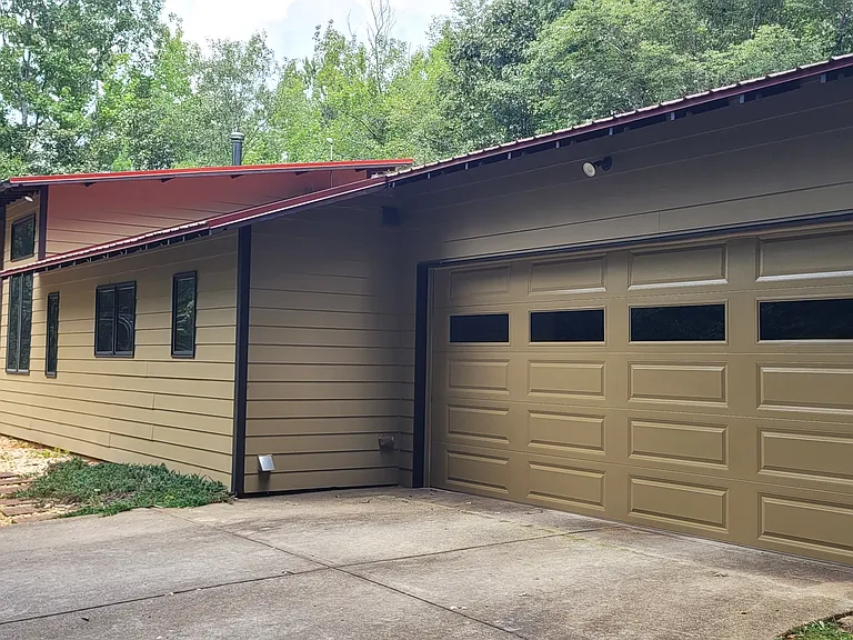 Large 2 Car Garage attached to house. The mudroom / laundry room is your first stop upon entering the house.