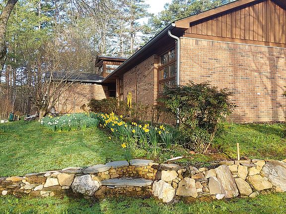 Landscaping flowers and boulders