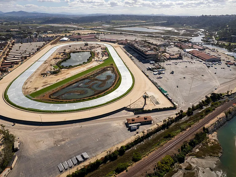 San Diego horse racing takes place where the "turf meets the surf" at the Del Mar Racetrack when fans flock to the track to wager on their favorite horse