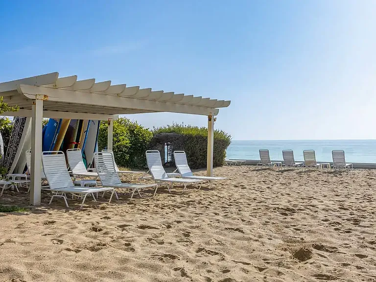 Step into coastal bliss with direct beach access_a private entrance to the ocean's embrace.