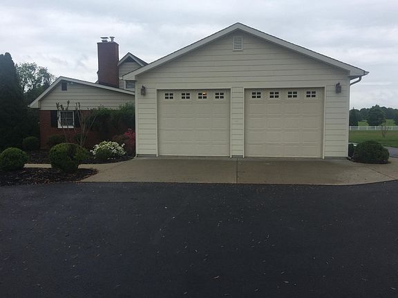 2 car garage and parking area
