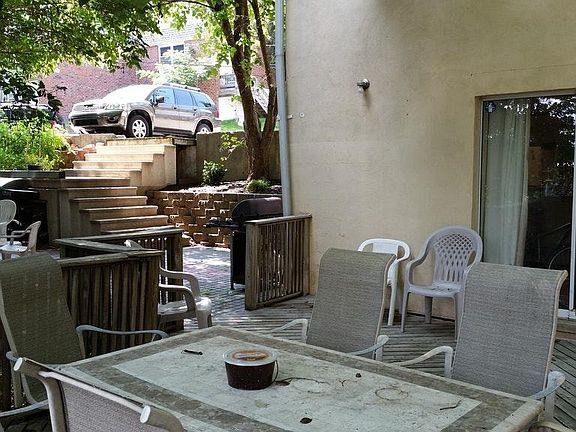 private deck looking to shared patio area