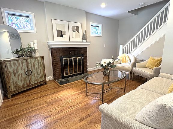 Living room with decorative fireplace