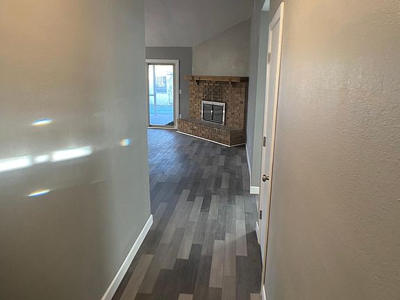 Entry and wood burning fireplace