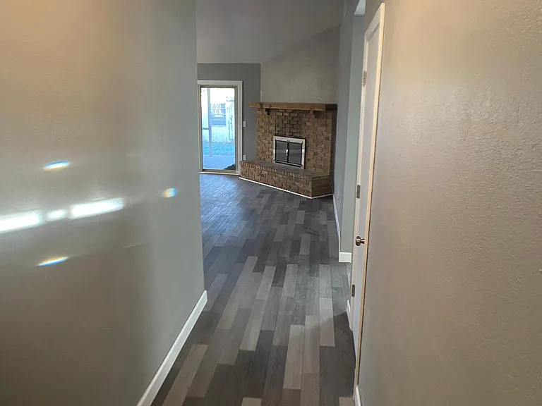 Entry and wood burning fireplace