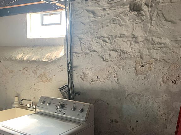 Shared laundry area (Washer & tub picture, dryer not pictured)