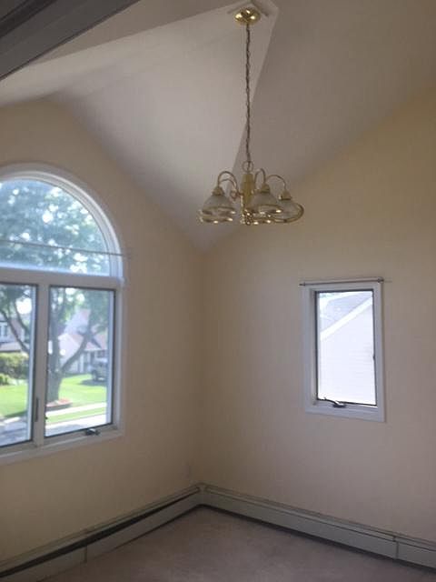 Very Large Bedroom With Cathedral Ceilings 