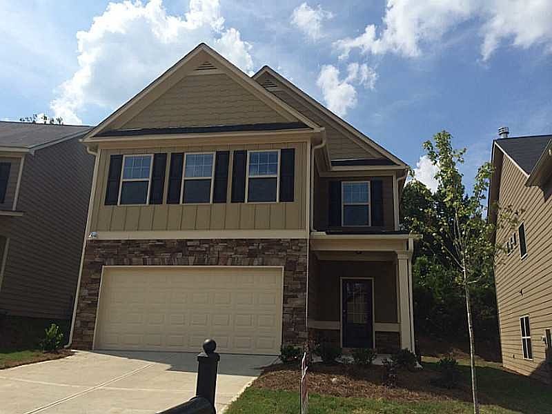 Craftsman style home located minutes from Mall of Ga and 85!