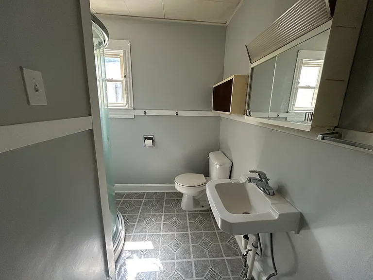Full bathroom with standing shower
