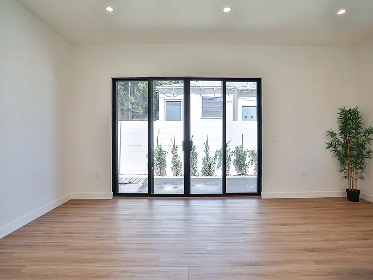 Living room with large sliding windows