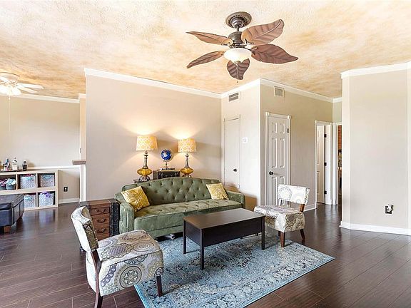 The living room opens to the dining area. It has lots of storage.