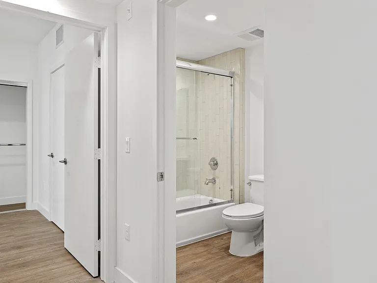 Bedroom and a Bathroom with Shower Bath