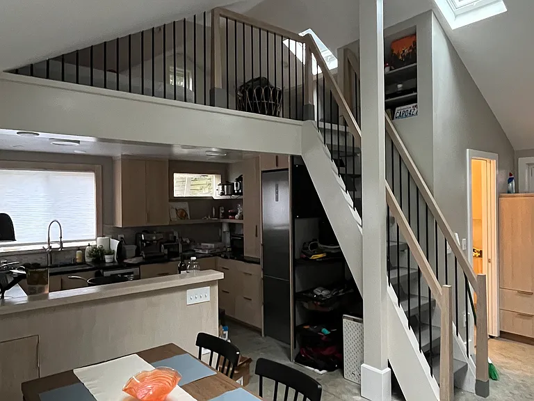 A versatile space! Vaulted ceilings w/ several big skylights. Pocket door next to closet leads to bathroom & Miele laundry room. Dining room, & modern kitchen & oak bar.