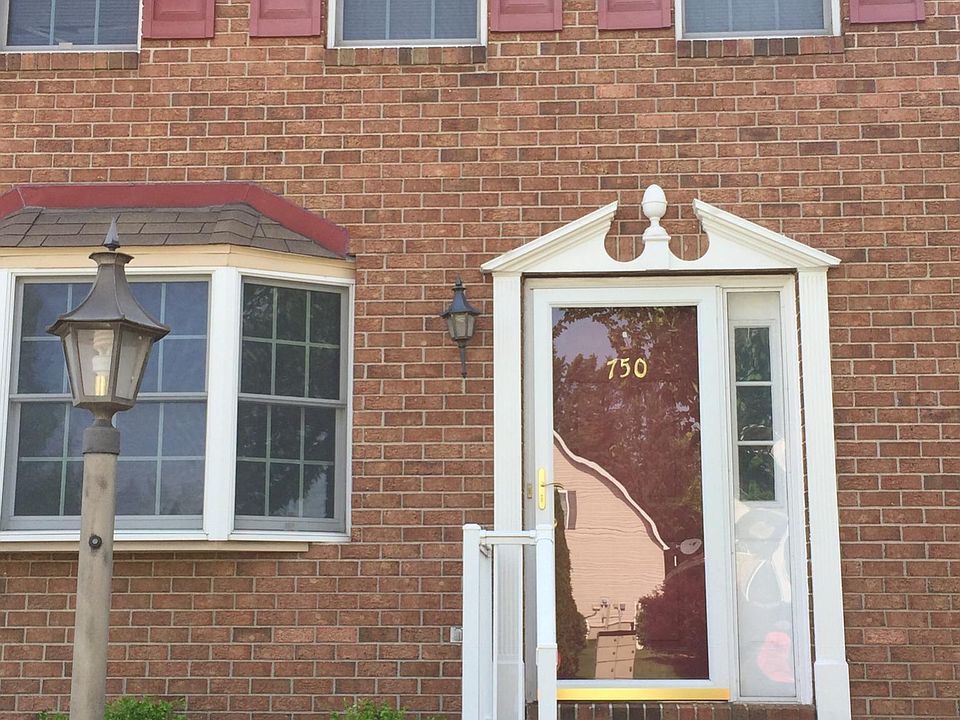 front entrance, has black door