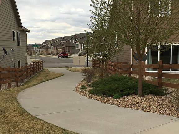 Walking path to side of home