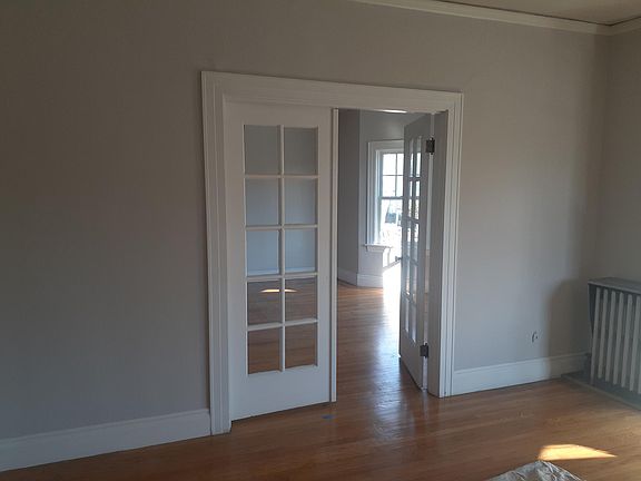 French Doors dividing living and Bedroom