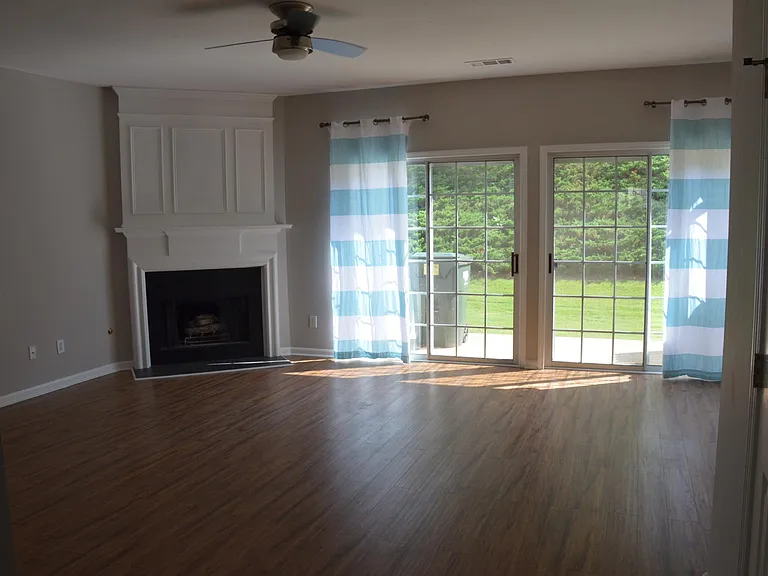 Living Room with Gas Fireplace and Double Glass door Open concept