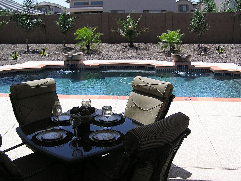 Pool and professionally landscaped backyard