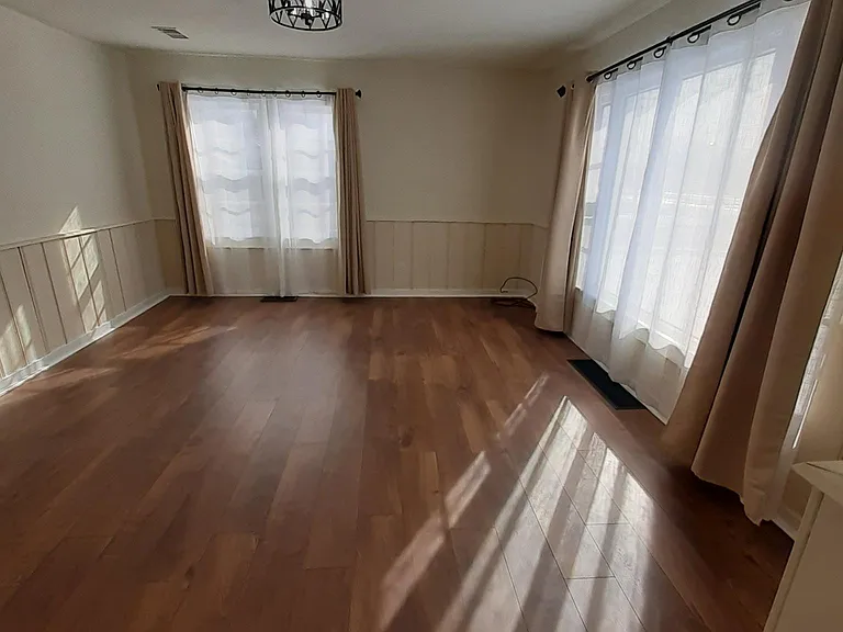 living room with included drapes