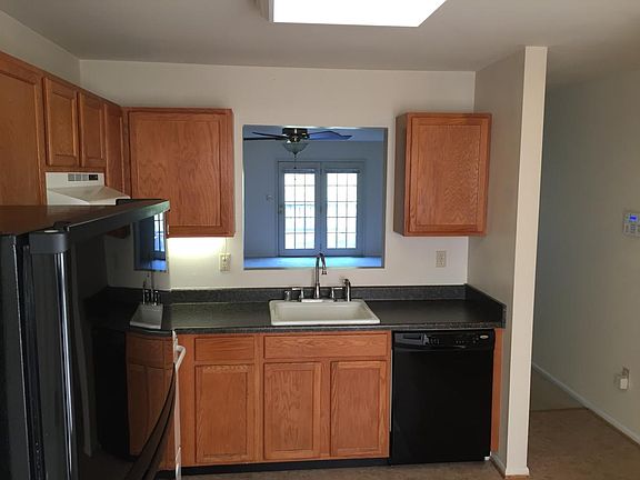 Kitchen opening to dining room