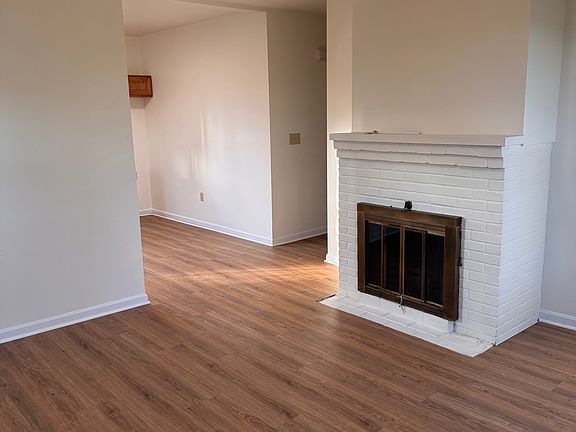 living room looking into the kitchen
NOTE (fireplace is non-working for show only)