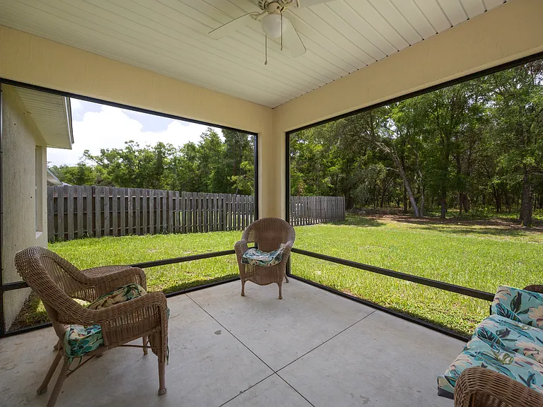 UNFURNISHED SCREENED BACK PATIO