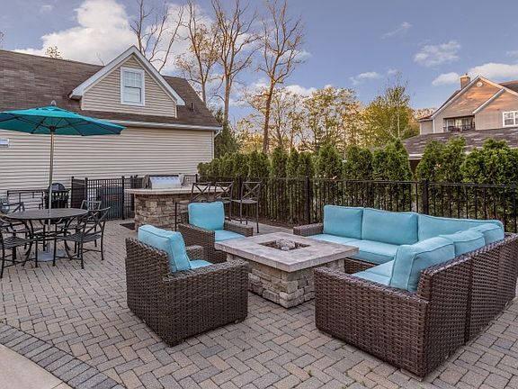 Fireside lounge at Grand Reserve Orange apartments in Orange