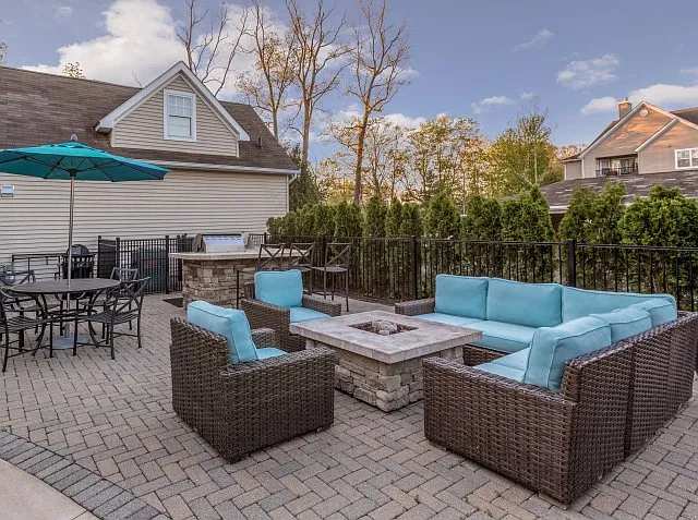 Fireside lounge at Grand Reserve Orange apartments in Orange